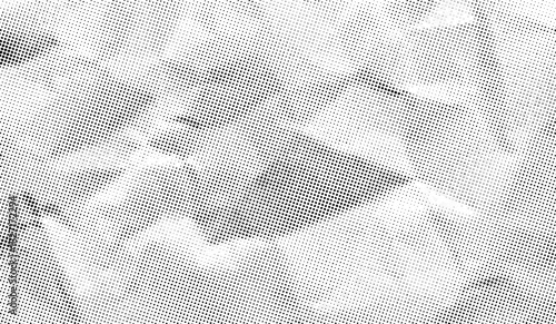 Halftone crumpled paper texture with a dotted, rough, and wrinkled surface. Black creased sheet background in comic pop-art style, featuring grainy folds and gritty distressed details.
