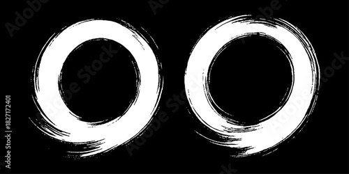 Two bold black ink circles painted with dynamic brush strokes, minimalist Japanese sumi-e style, clean background.