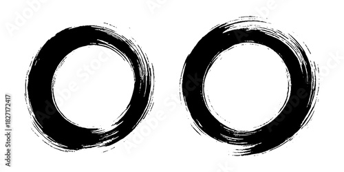 Two bold black ink circles painted with dynamic brush strokes, minimalist Japanese sumi-e style, clean background.