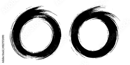 Two bold black ink circles painted with dynamic brush strokes, minimalist Japanese sumi-e style, clean background.