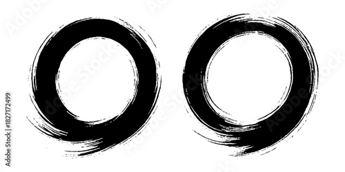 Two bold black ink circles painted with dynamic brush strokes, minimalist Japanese sumi-e style, clean background.