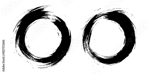 Two bold black ink circles painted with dynamic brush strokes, minimalist Japanese sumi-e style, clean background.