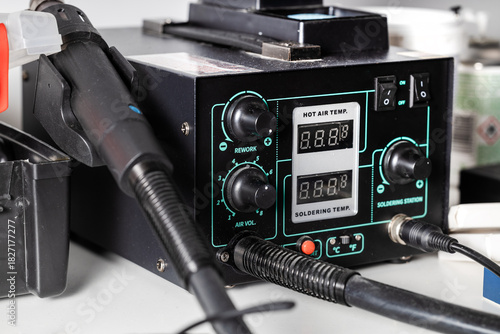 Close-up of a soldering station for electrical equipment repair.