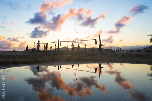 Beach Volleyball at Sunset, in Santos, with Dramatic Reflection