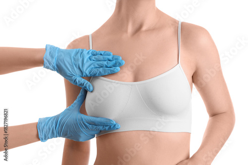 Plastic surgeon touching wo...