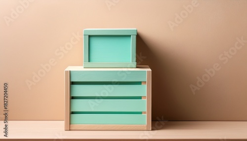light beige background stacked wooden boxes one mint green box