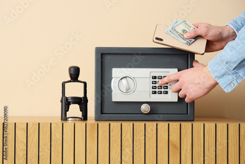 Man with money and mobile p...