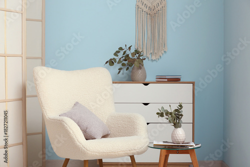 Armchair and table with euc...