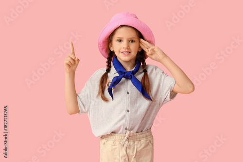 Little girl scout making sc...