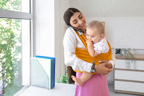 Young business mother with ...