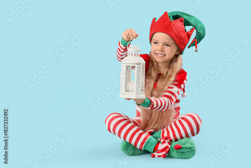 Cute little girl in elf cos...
