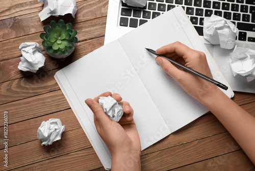 Female hands with notebook,...