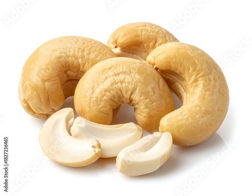 Studio Shot of Whole and Split Cashew Nuts on White Background