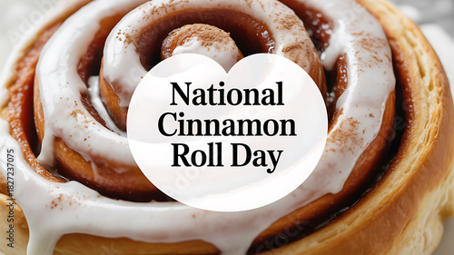 Close-up of a cinnamon roll with white icing and text overlay celebrating National Cinnamon Roll Day