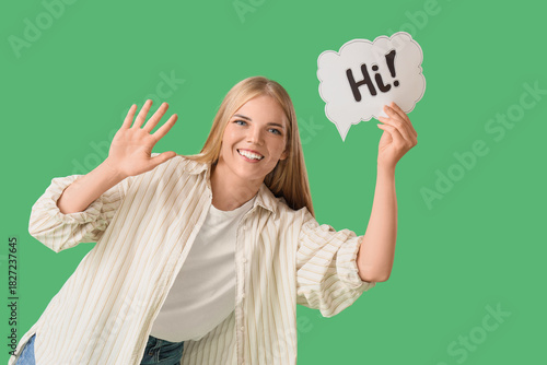 Young woman holding speech ...
