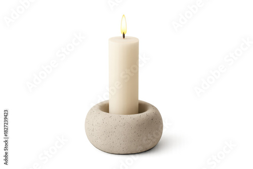White burning candle in modern concrete holder