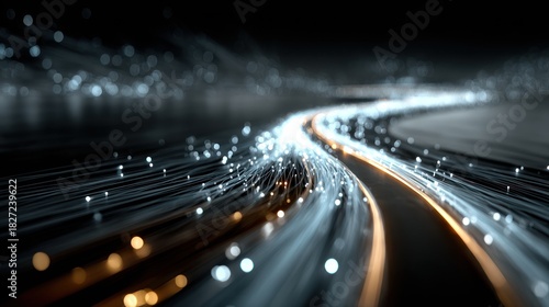 Abstract image of fiber optic cables with illuminated particles and a dark background