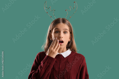 Surprised teenage girl with...