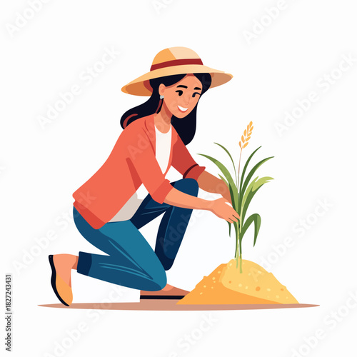 Female gardener planting a young plant in soil.