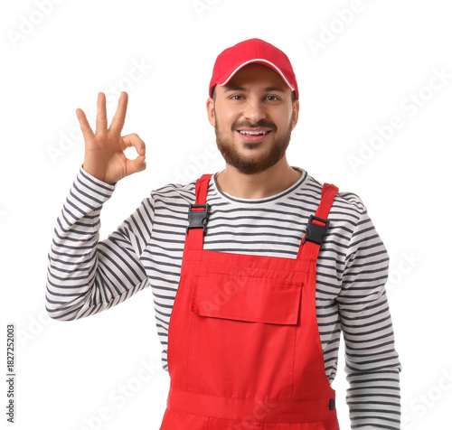 Male worker showing OK on w...