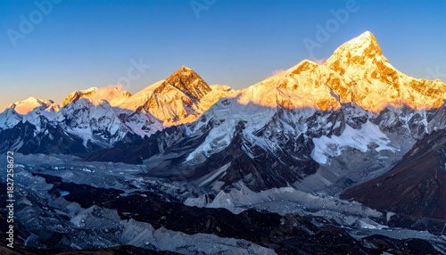 Wallpaper Mural Majestic Mountain Range at Sunrise with Glowing Snow-Capped Peaks Torontodigital.ca