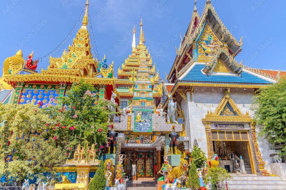 Fototapeta premium 27 November 2025 View of Temple Wat Paknam Phase Charoen with Large Golden statue of Buddha and sleeping Buddha on Klhong Dan a Canal river system in BKK Bangkok Thailand