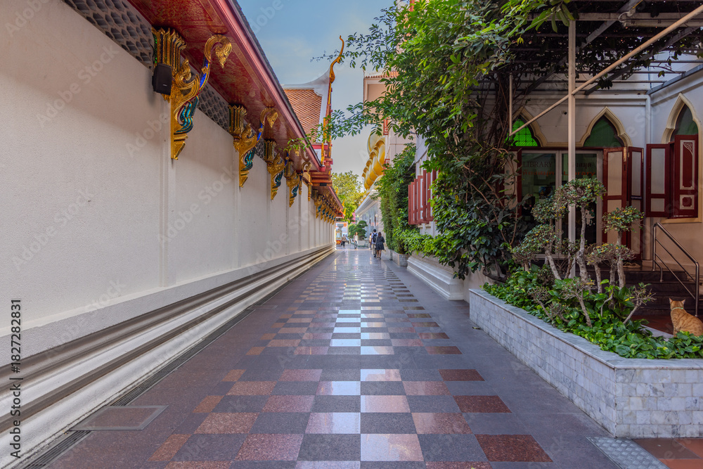 Fototapeta premium 27 November 2025 View of Temple Wat Paknam Phase Charoen with Large Golden statue of Buddha and sleeping Buddha on Klhong Dan a Canal river system in BKK Bangkok Thailand