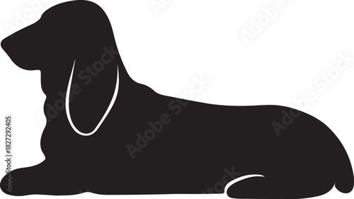 A simple black silhouette of a dachshund lying in a relaxed pose