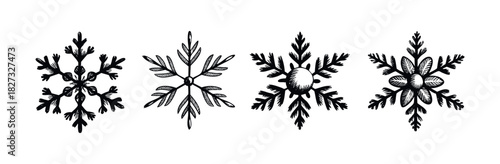 Set of four distinct hand drawn snowflakes in black ink for winter holiday and Christmas celebrations and designs