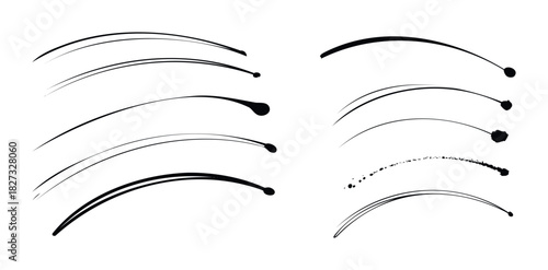 Abstract black brush strokes and splatters on a white surface suggesting dynamic movement and artistic expression for graphic design and branding projects