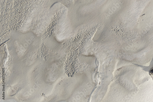 Fototapeta Naklejka Na Ścianę i Meble -  Aerial View Of Sand Dunes With Wind Ripples And A Weathered Log In Desert