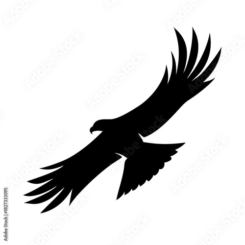 Soaring black eagle silhouette in flight against a pristine white background artwork. soaring black eagle