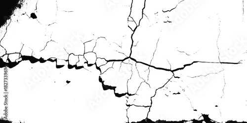 Cracks on the concrete wall. Broken and grated urban street wall construction