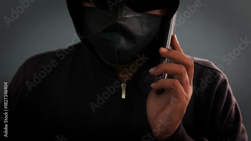 Phone Scammers, mysterious man with phone, cyber theft and fraud, mobile phone used for hacking, secret attacks on privacy