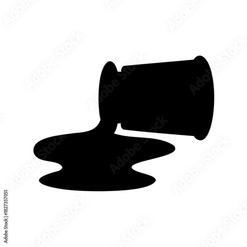 Spilled liquid from a container creating a visually striking black silhouette design