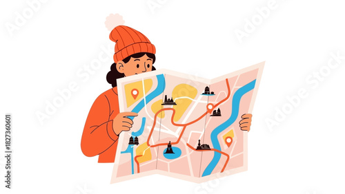 A person in a winter hat studying a colorful travel map for directions and landmarks