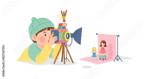 Child Engaged in Creative Toy Photography with Small Characters in a Studio