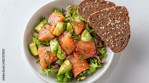 Delicious salmon avocado salad with fresh dill and whole grain bread for healthy eating and wellness inspiration, perfect for a light lunch