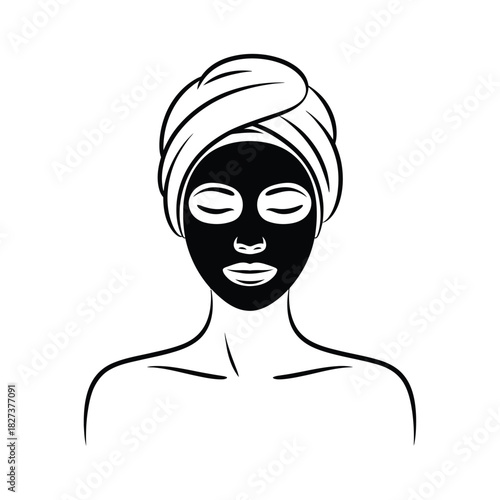 Woman with black face mask and towel on head