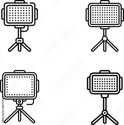 Set of four hand drawn led light panels on tripods for photography and video