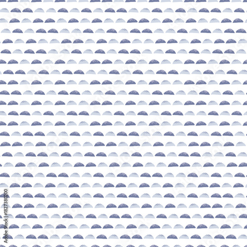 Seamless pattern with abstract blue-purple hand drawn hills or scales on white background. Hand drawn semicircle scales seamless background texture in pastel violet tones. Cute abstract doodle waves. 