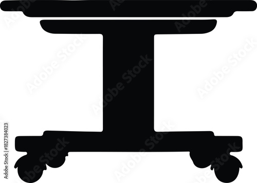 Illustration of an examination table in black silhouette vector