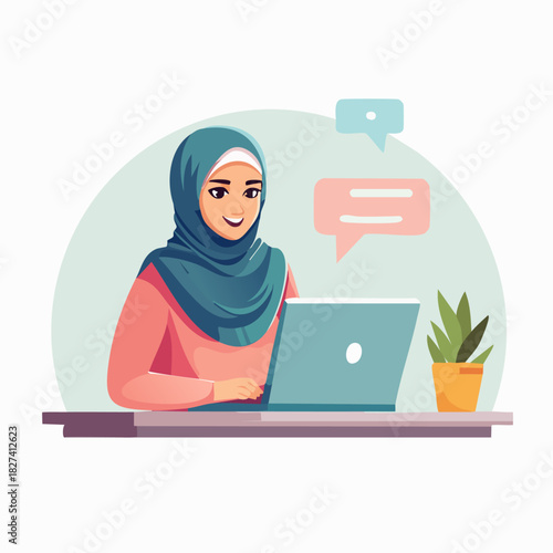 Woman in hijab working on laptop at desk.