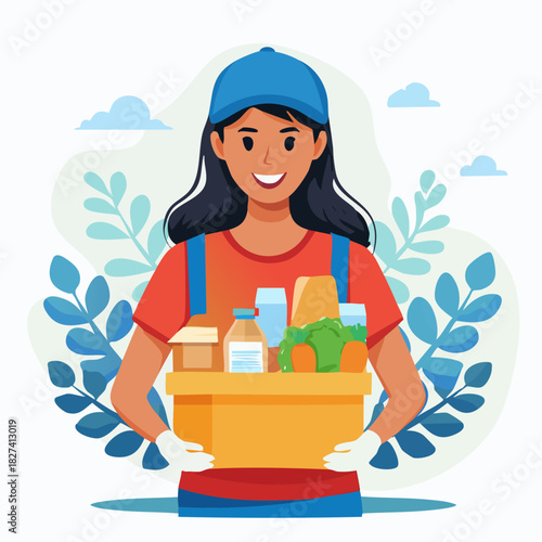 Female delivery worker holding grocery box.