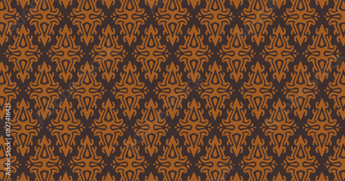 Brown and orange tribal-style geometric pattern with repeating sharp motifs in a textured seamless layout.