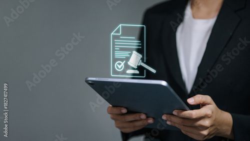 Business Tablet with Holographic Contract and Gavel Icon