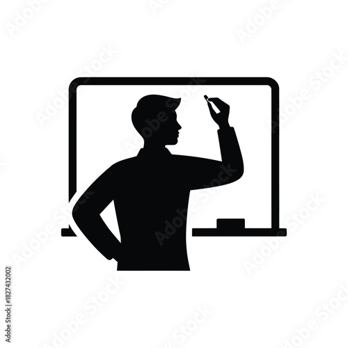 Silhouette of a person writing on a whiteboard with chalk