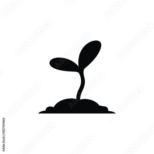 Simple black silhouette of a young plant sprouting from soil