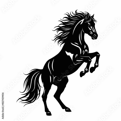 Majestic Black Horse Rearing Up Silhouette with Flowing Mane and Tail.