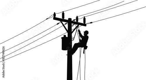Silhouette of lineman working on power pole with transformer and wires electricity